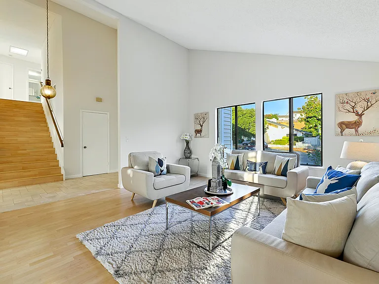 Living room with vaulted ceiling