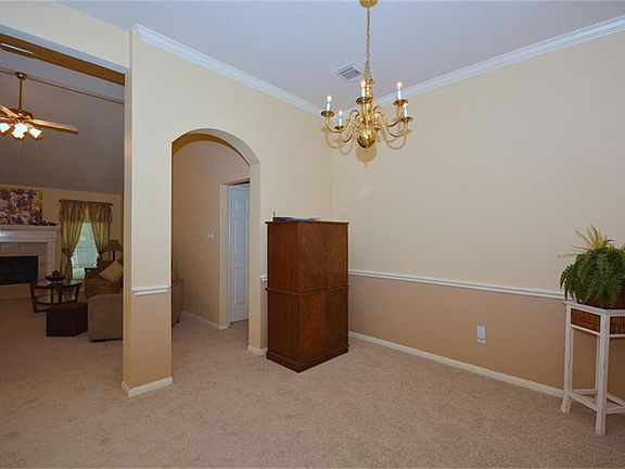 Arch over doorway adds to the ambiance of the room.