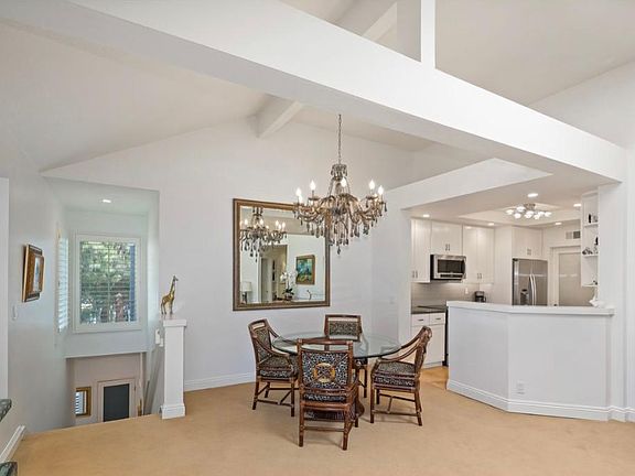Living, dining areas.
Carpet has been replaced for wood flooring