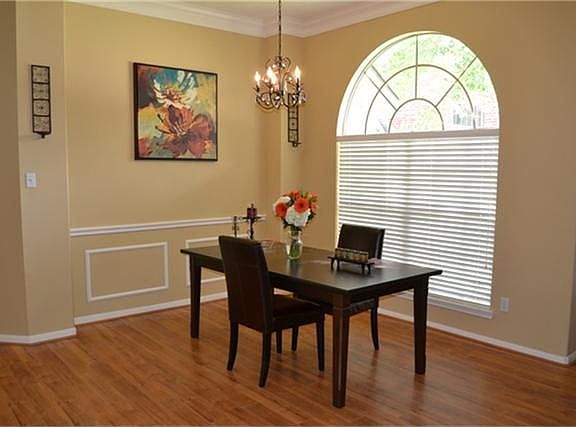 Formal Dining Room with New Wood Laminate Floors.