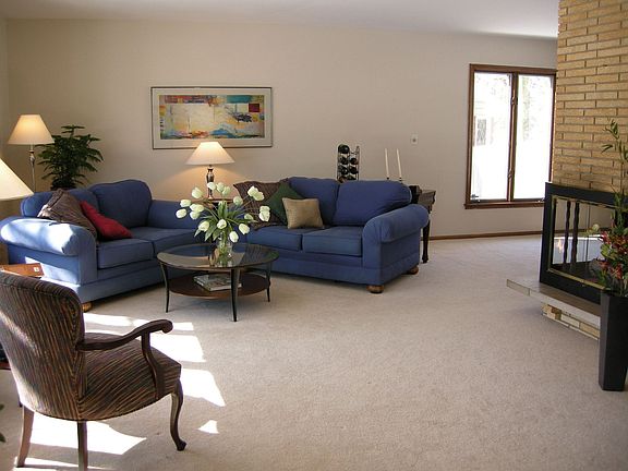 Three sided gas fire place.