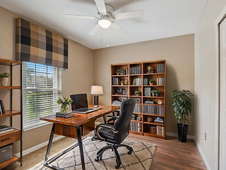 Bedroom 4 - Virtually Staged to show the room's potential. Even though it's shown as an office here, the room is a traditional bedroom with door, closet and window.
