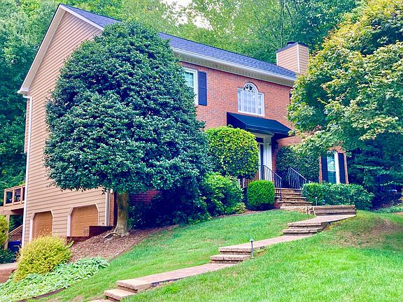 Professionally landscaped, great outside play areas open into cul de sac.