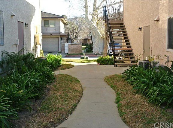 Staircase to upper level back unit