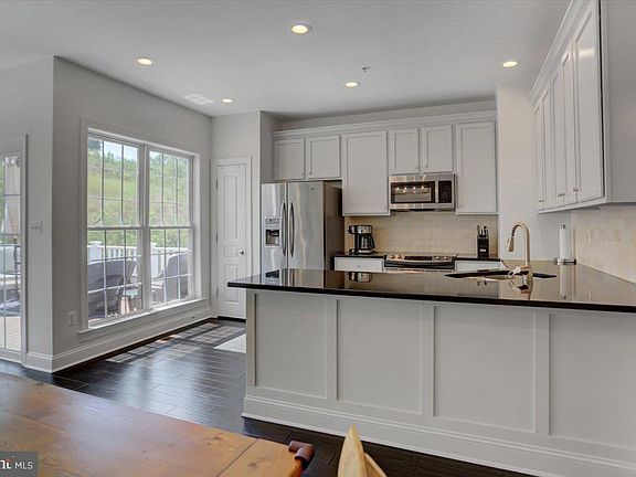 4th image of 6382 Meandering Woods Ct
