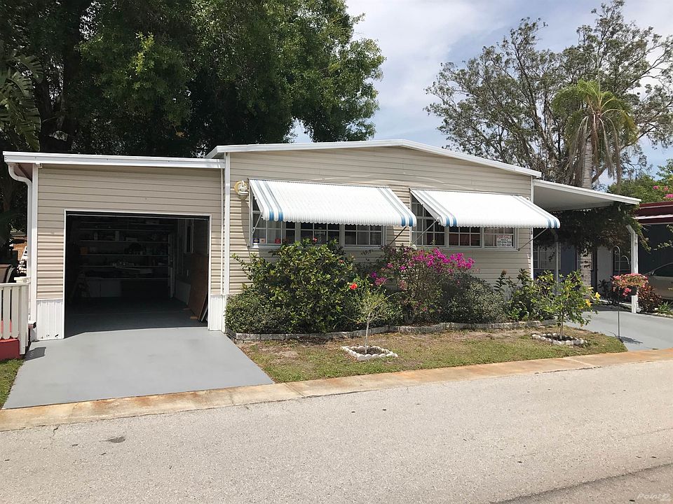 3/2/1 car garage plus carport and shed