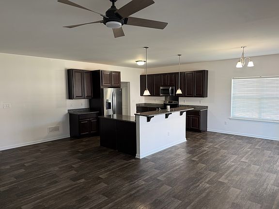 Open floor plan great room. Kitchen/dining/living