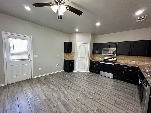 Kitchen with stainless steel appliances