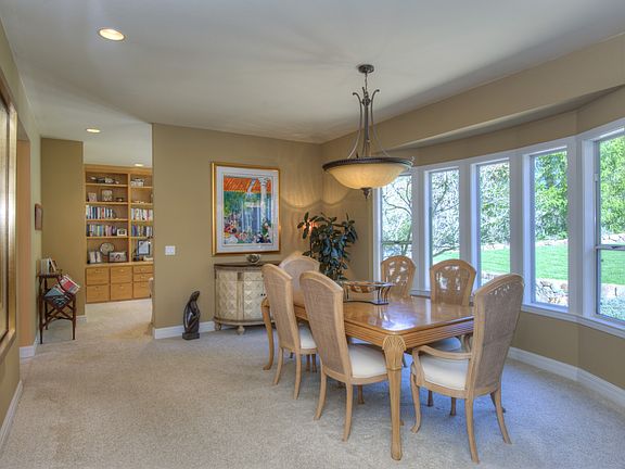 FORMAL DINING, DEN IN BACKGROUND