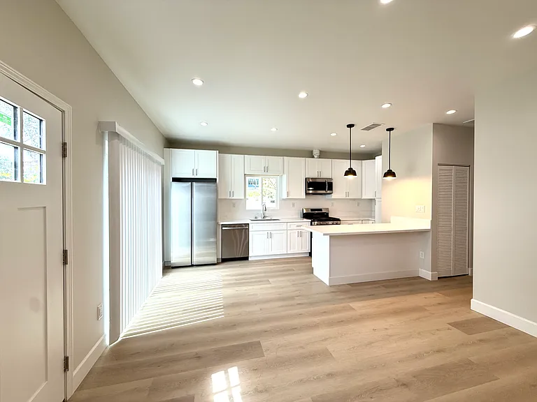 open floor plan, high ceiling