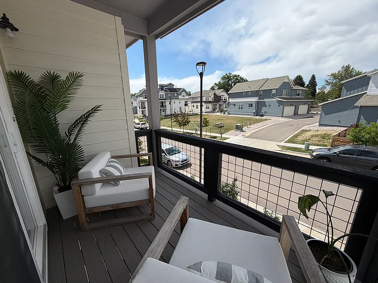 Covered front porch facing neighborhood park