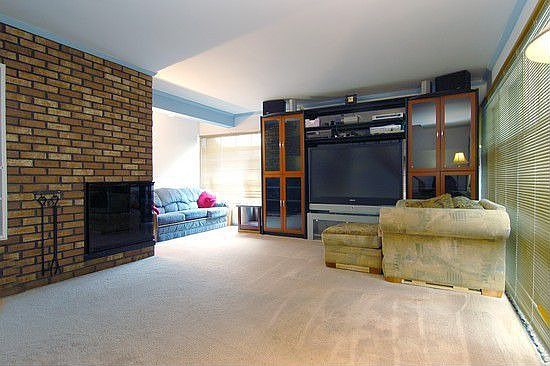 Living Room with Wood Buring Fireplace