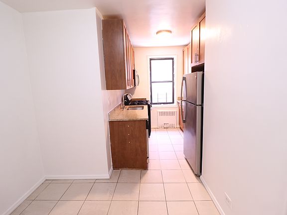 4th image of 9830 67th Ave APT 3F