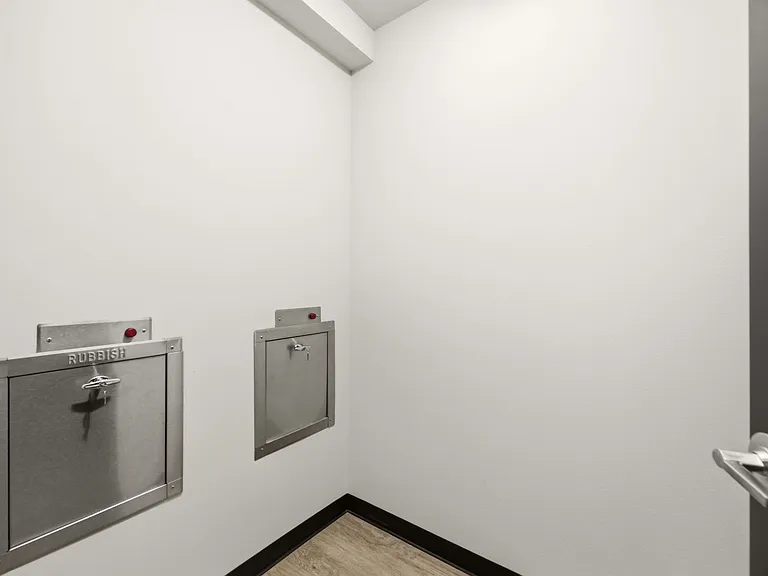 Trash/Refuse & Recycling Shoot on First Floor, down the hall