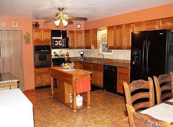 Updated kitchen with pantry and granite countertops