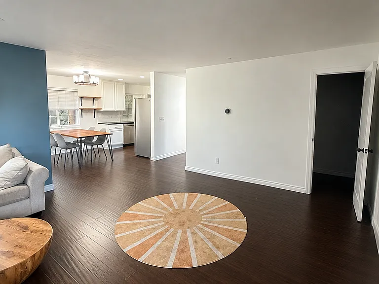 Upon entering the home: living room opens to the dining space and kitchen.