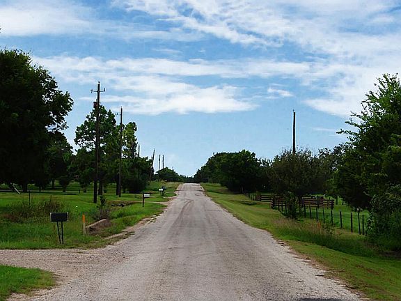 The quintessential country roads leads to the property