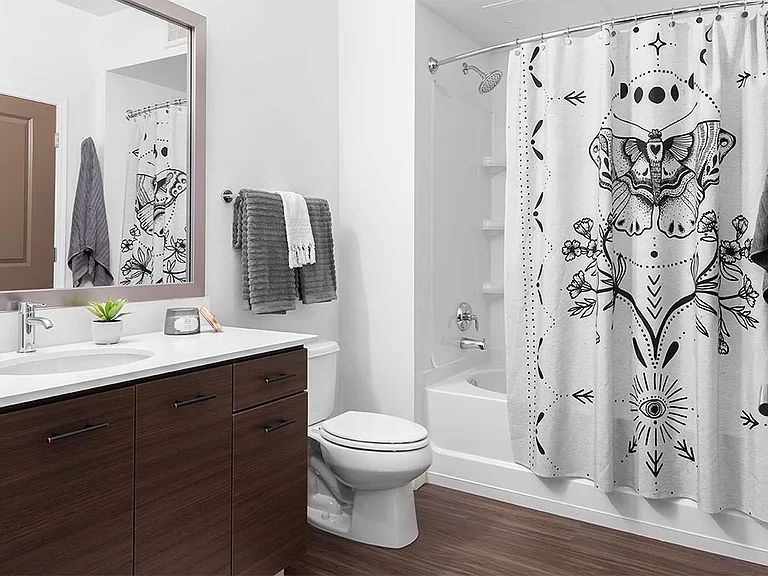 Bathroom with Large Soaking Tub and Wood-Style Flooring.