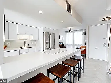 Kitchen area and designer dining island