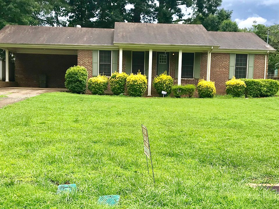 Front yard and carport
