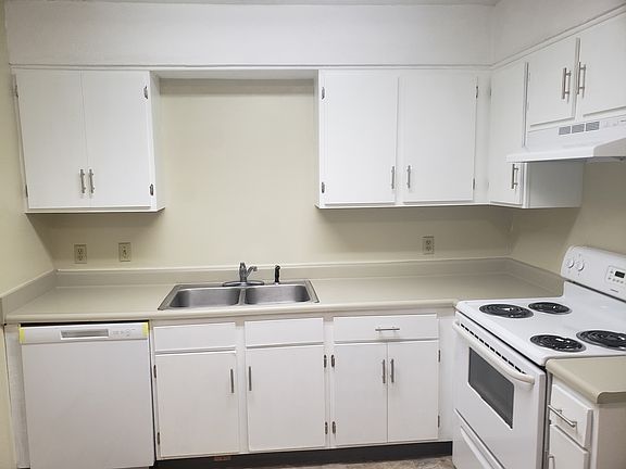 Kitchen with refurbished cabinets and counter tops