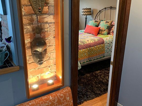 lighted niche welcoming you to master bedroom