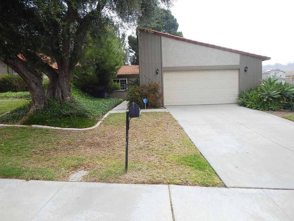 Attached garage with driveway