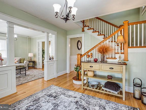 Foyer, wood floors, new light fixtures throughout