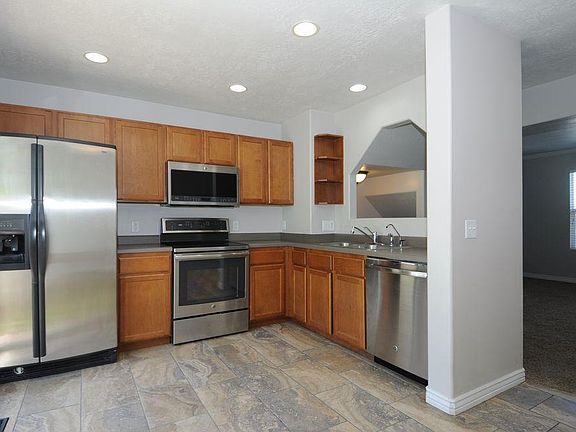 Spacious kitchen with stainless steel appliances