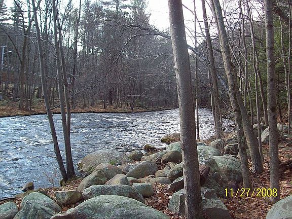 Home Sits on Miller River