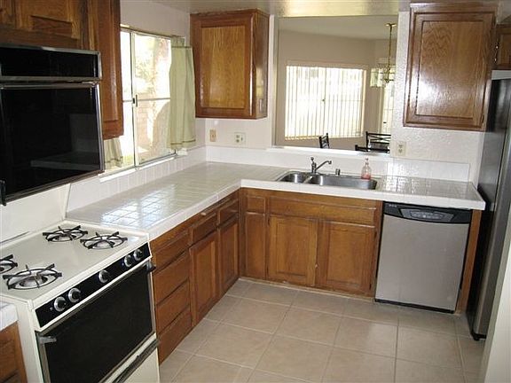 Closeted laundry in kitchen