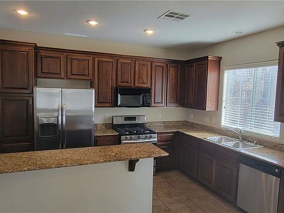 3rd image of 9547 Leaping Lizard St
