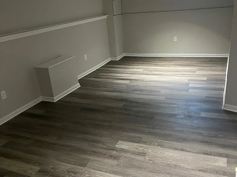 Large finished basement with lots of light (side one).