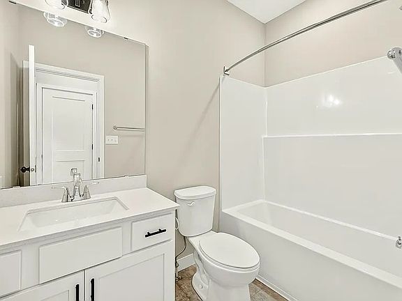 Bathroom vanity and tub