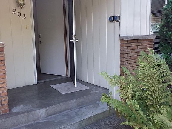 Front door with security screen door and keyless entry.
