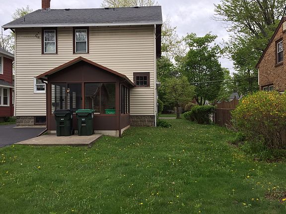 Back of house with Sunroom