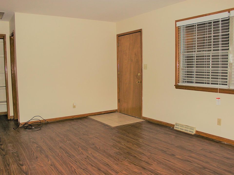 Living area with hardwood floor