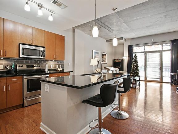 5th image of 711 Cosmopolitan Dr NE Unit Tl8