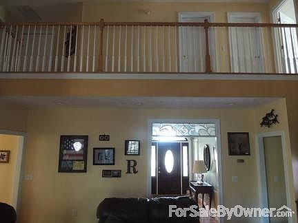 Family Room
						:
						Loft ceiling showing upstairs