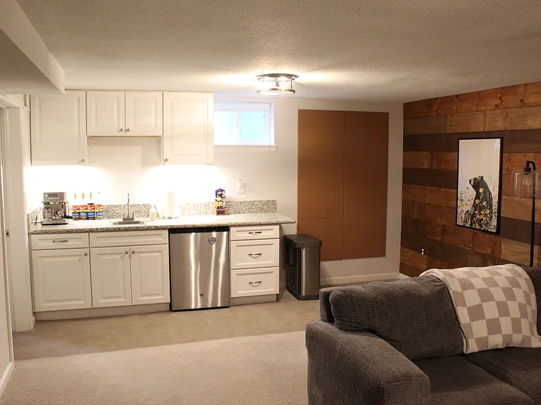 Bar with sink and mini fridge