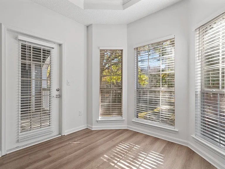 Alcove area with balcony access in select homes