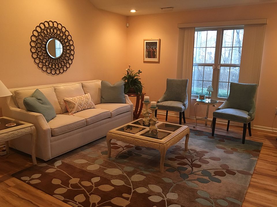 Living room. View of woods. 