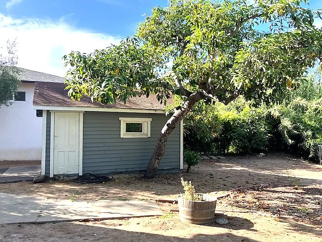 Backyard & side of garage