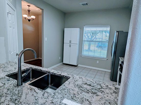 Just renovated kitchen, granite countertops, new cabinets and appliances. Tile counter backsplash to be installed