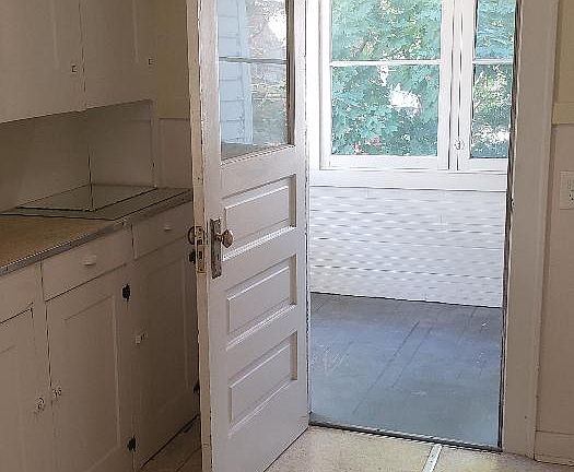 Kitchen leading to 3 season porch