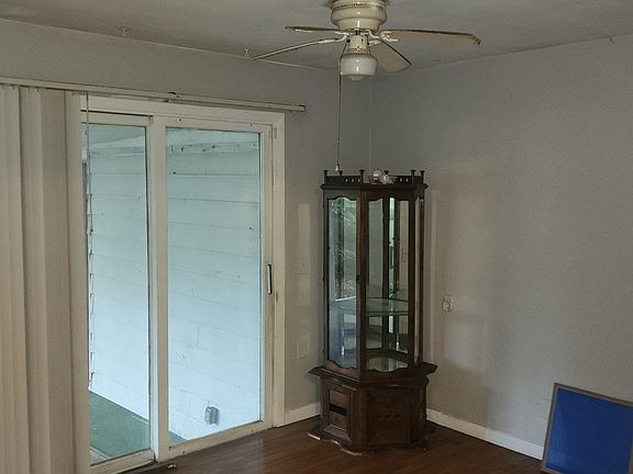 Dining room, exits to a porch in the back yard.