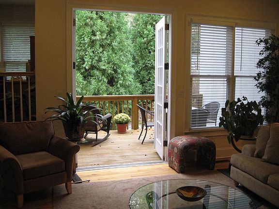French doors lead to a quiet, private deck.