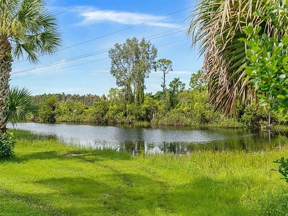 5th image of 7744 SE Needle Palm Cir