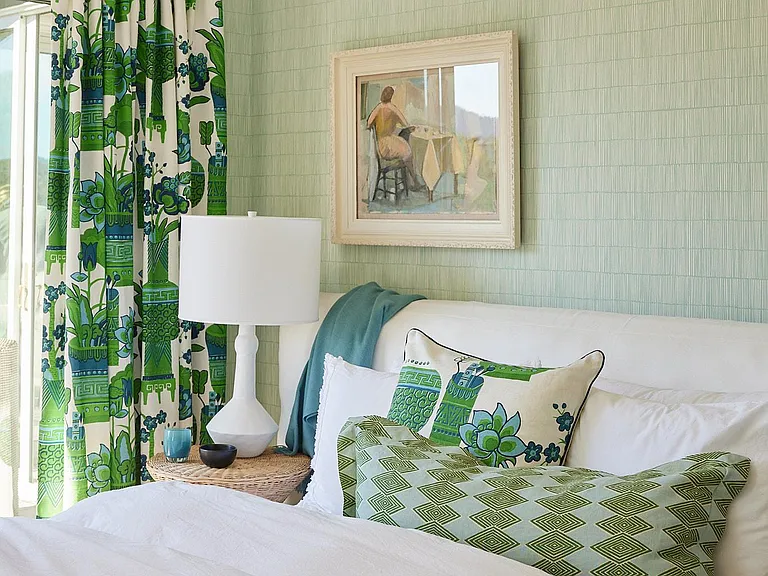 'Green Bedroom' - Queen size bedroom off of enclosed hallway. This view-facing bedroom has sliding patio doors to the deck. Nice sized closet with hang bar and shelf.