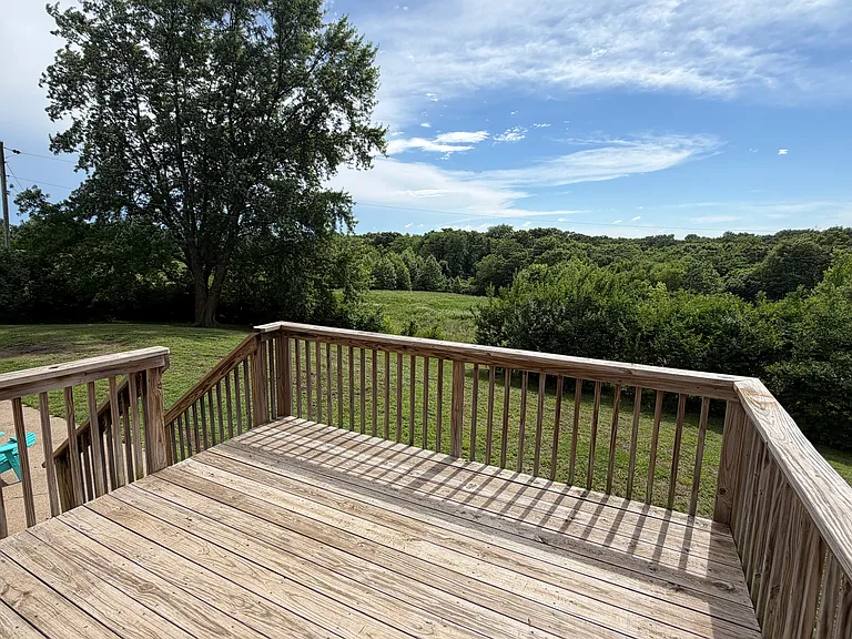 Open the kitchen door, step outside, and enjoy a view that feels more like a private retreat than a backyard.